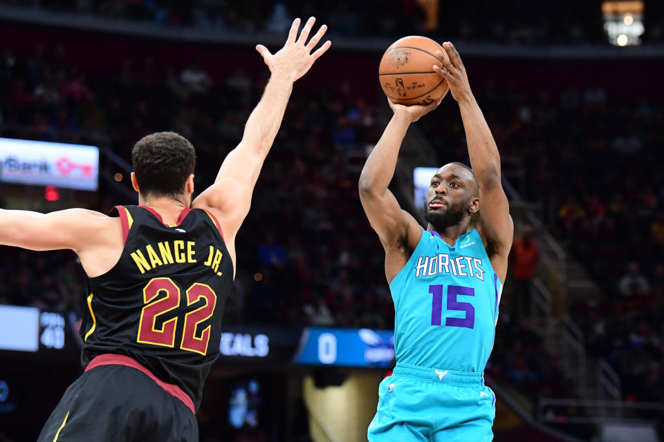 CLEVELAND, OHIO - APRIL 09: Larry Nance Jr. #22 of the Cleveland Cavaliers tries to block Kemba Walker #15 of the Charlotte Hornets during the first half at Rocket Mortgage FieldHouse on April 09, 2019 in Cleveland, Ohio. (Photo by Jason Miller/Getty Images)