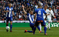 Soccer Football - La Liga Santander - Real Madrid vs Deportivo Alaves - Santiago Bernabeu, Madrid, Spain - February 24, 2018 Real Madrid’s Cristiano Ronaldo scores their first goal REUTERS/Juan Medina