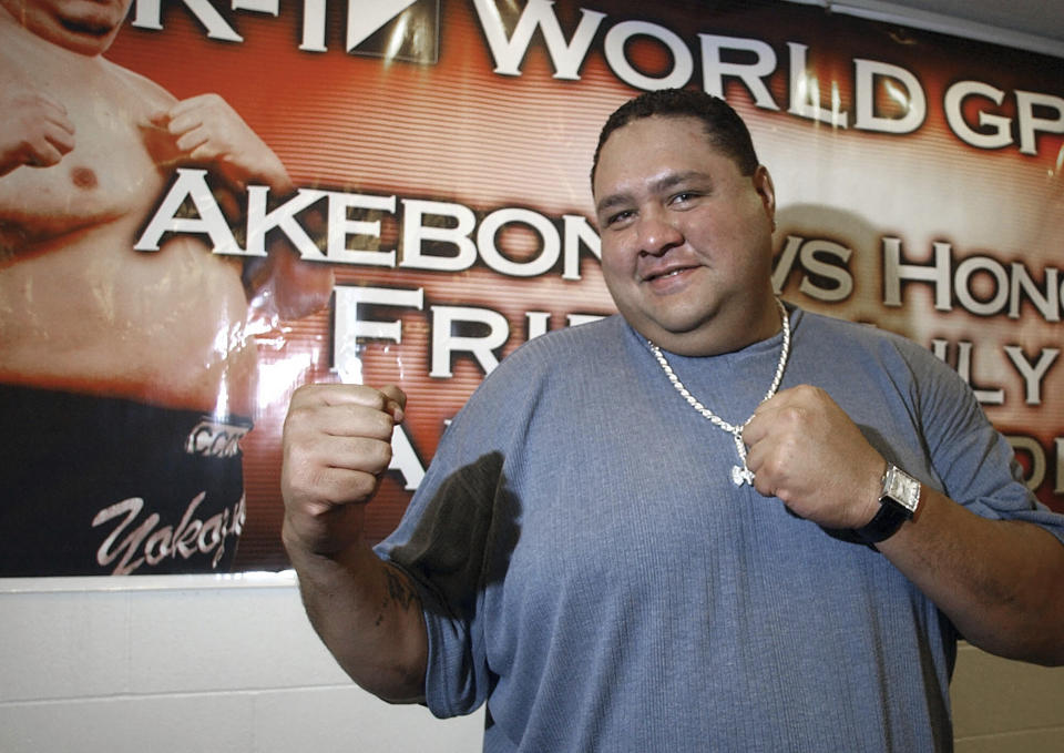 FILE - Akebono poses for a photo during a news conference at Aloha Stadium in Honolulu, Tuesday, July 26, 2005. Hawaii-born Akebono, one of the greats of sumo wresting and a former grand champion, is reported to have died earlier this month of heart failure while receiving care at a hospital in Tokyo, the United States Forces in Japan said in a statement on Thursday, April 11, 2024. (AP Photo /Lucy Pemoni, File)