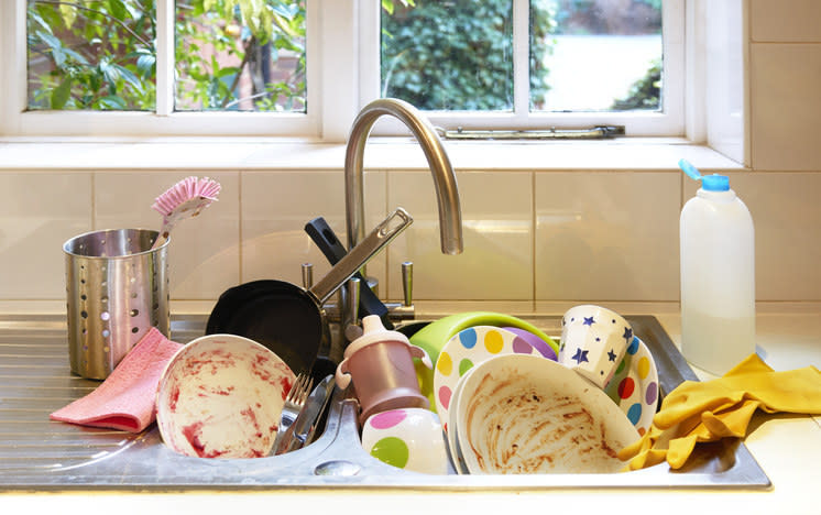 A sink full of dirty dishes