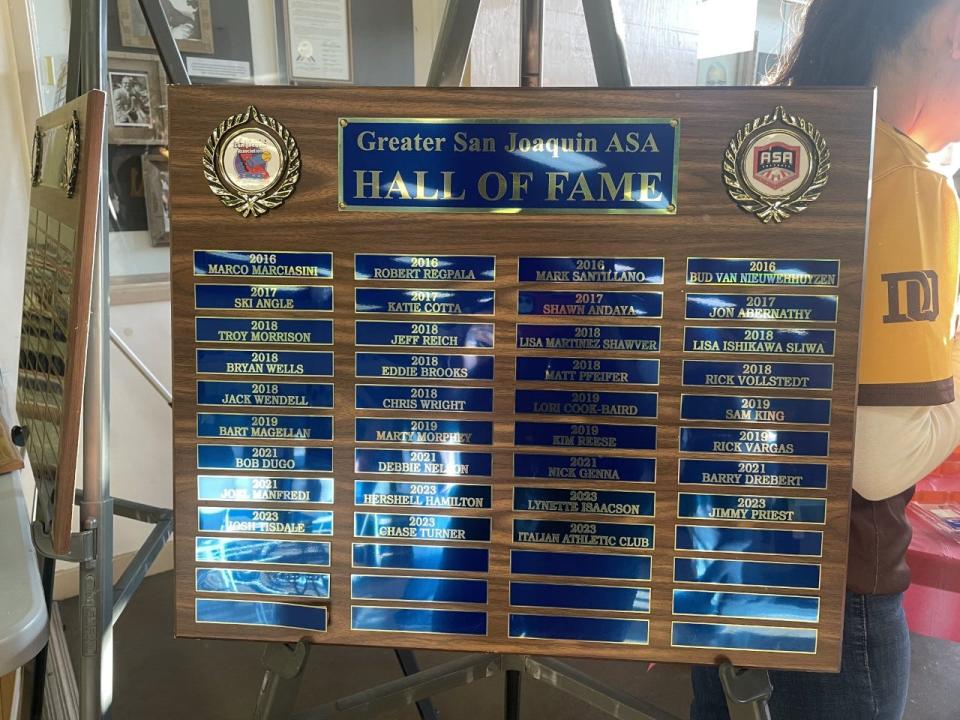 Greater San Joaquin Softball District Hall of Fame plaque sits at the front of the Lodi Grape Festival during the Hall of Fame event on Saturday, March 25, 2023.