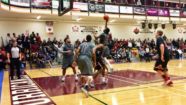 Holland College advances in men's basketball championships