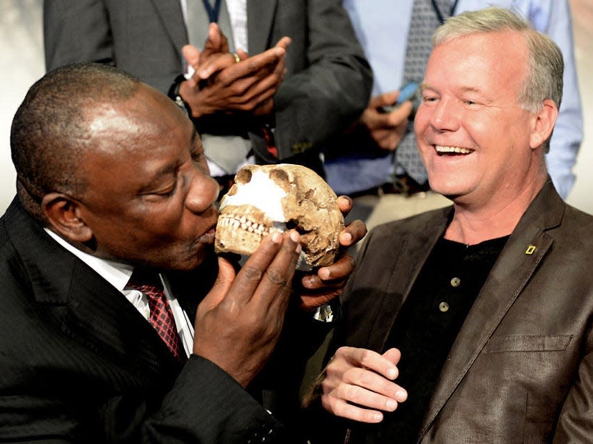 Cyril Ramaphosa and Professor Lee Berger at the reveal of the discovery of a new species of human relative.