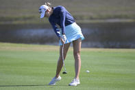 Jessica Korda hits from the seventh fairway during the final round of the Tournament of Champions LPGA golf tournament, Sunday, Jan. 24, 2021, in Lake Buena Vista, Fla. (AP Photo/Phelan M. Ebenhack)