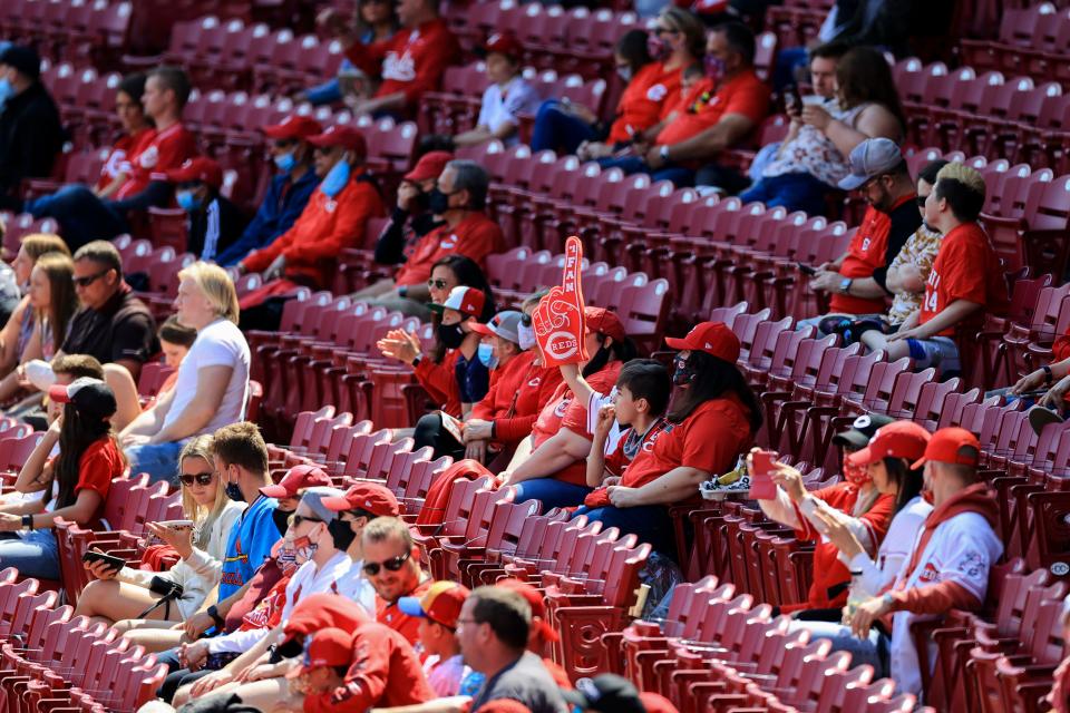 Fans in Cincinnati watch game action between the St. Louis Cardinals and the Reds.