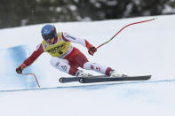 FILE - Austria's Matthias Mayer speeds down the course during an alpine ski, men's World Cup downhill, in Val Gardena, Italy, Thursday, Dec.15, 2022. Once known as skiing’s “Wunderteam” for its domination of the ski racing circuit, Austrian men and women have both been struggling for results this season while Austrian coaches are lending their expertise to other nations. (AP Photo/Gabriele Facciotti, File)