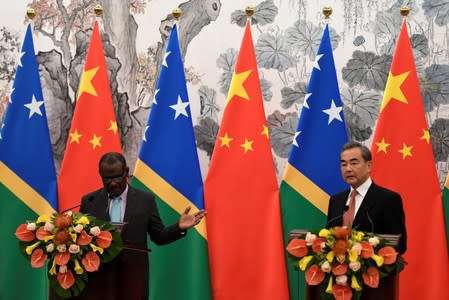 Solomon Islands Foreign Minister Jeremiah Manele and Chinese State Councilor and Foreign Minister Wang Yi hold joint news conference at the Diaoyutai State Guesthouse in Beijing