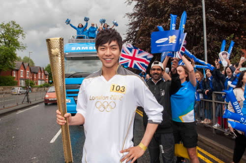 Lee Seung Gi participates in the Olympic torch bearing