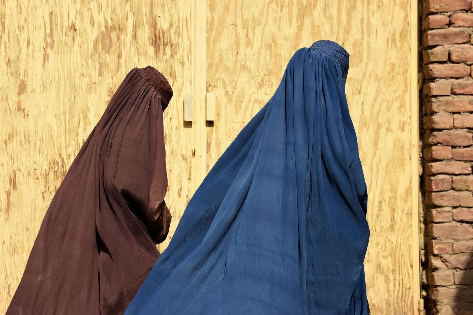Afghan women team walk together in Kandahar, Afghanistan, in October 2019.