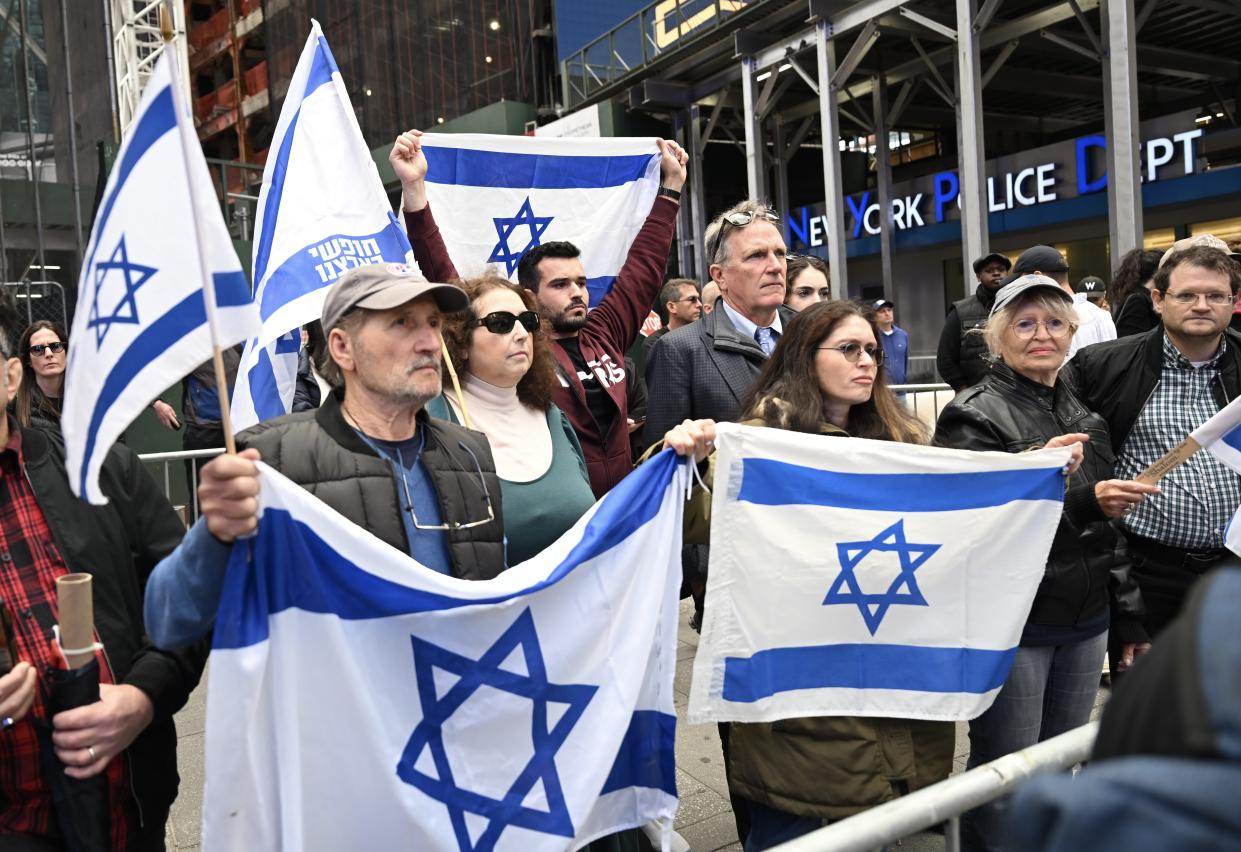 Supporters of Israel and supporters of Palestinians hold demonstrations at the same time in Times Square in New York City.