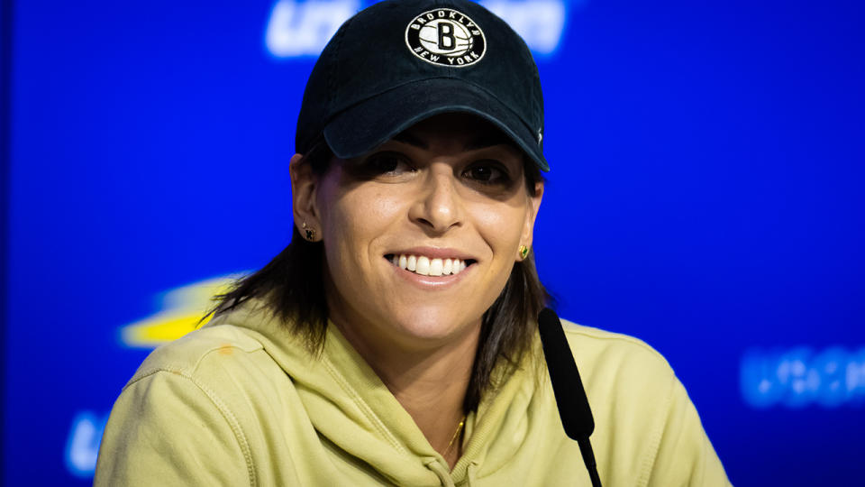 Ajla Tomljanovic smiles during a press conference at the 2022 US Open.