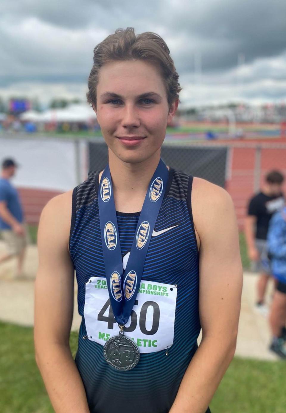 Seneca senior Vincent Rupp wears his silver medal after placing second in the Class 2A high jump at the PIAA track and field championships at Shippensburg University on Friday.