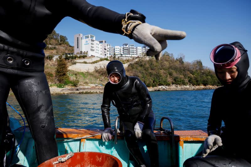 The Wider Image: For South Korea's youngest 'sea women', warming seas mean smaller catches