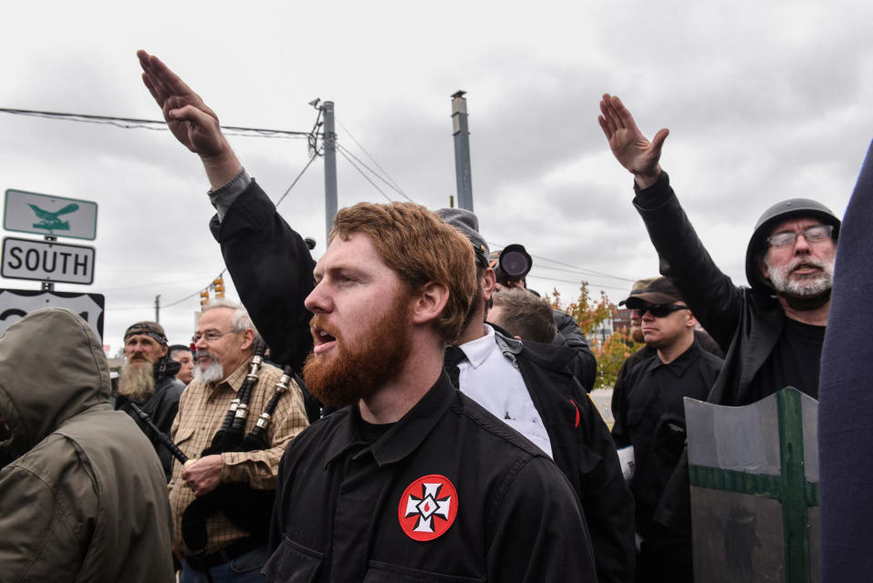 <p>People gesture while participating in a “White Lives Matter” rally in Shelbyville, Tenn., Oct. 28, 2017. (Photo: Stephanie Keith/Reuters) </p>