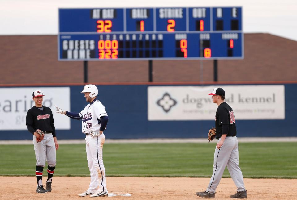 Jonathon LaGuire of Harrison is all smiles after his double off the left field fence scores a run in the bottom of the third inning against Lafayette Jeff Tuesday, April 24, 2018, in West Lafayette. Harrison defeated Jeff 14-1 in five innings.