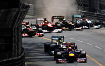 Mark Webber of Australia and Red Bull Racing leads Nico Rosberg of Germany and Mercedes GP after the start of the Monaco Formula One Grand Prix at the Circuit de Monaco on May 27, 2012 in Monte Carlo, Monaco. (Vladimir Rys Photography/Getty Images)