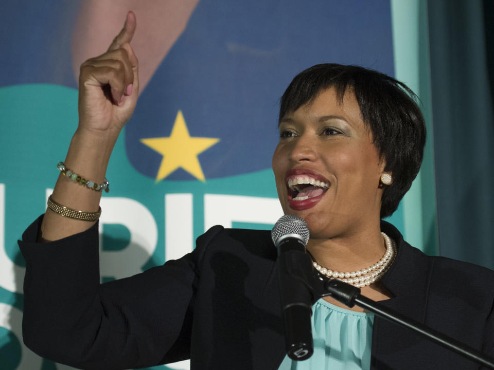 D.C. Mayoral candidate, and Council Member Muriel Bowser gestures as she addresses her supporters at her election night watch party to await the Democrate Primary results in Washington, Tuesday, April 1, 2014. (AP Photo/Cliff Owen)