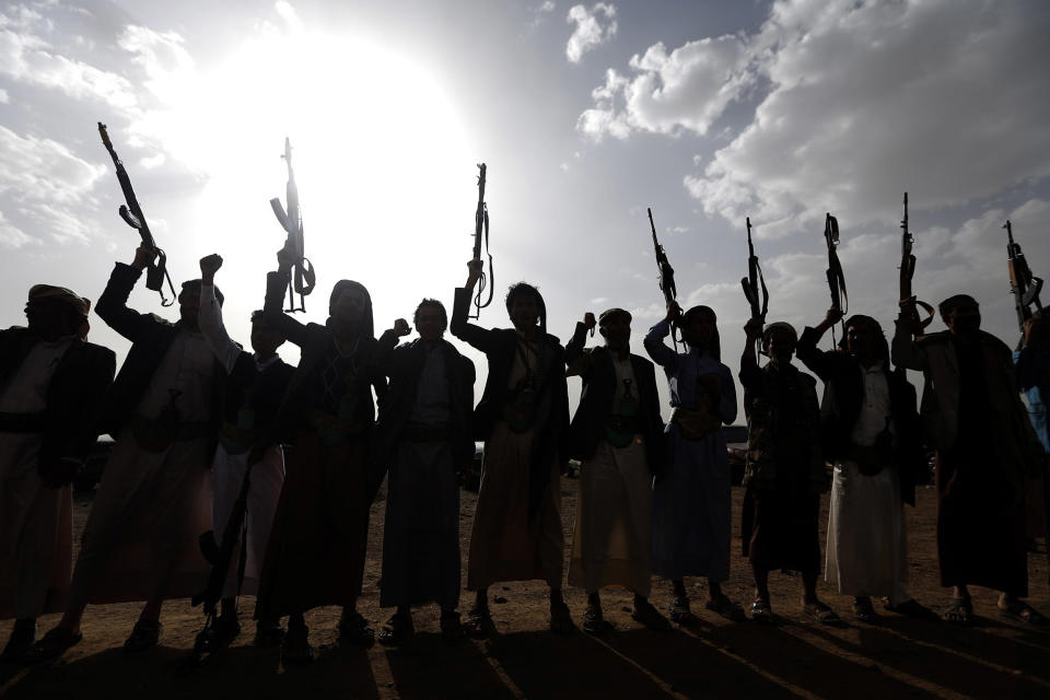 Image: Yemen's Shiite Huthi rebels shout slogans during a gathering to mobilise more fighters to battlefronts to fight pro-government forces, in the Yemeni capital Sanaa. (Mohammed Huwais / AFP/Getty Images file)