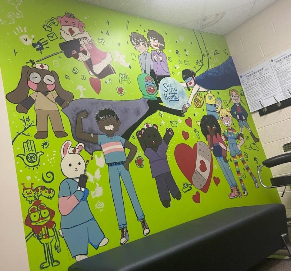 A mural painted at a health center in Grant Public Schools. The mural, painted by a Grant student, caused an uproar in October, and community members claim it could have prompted the district's board to terminate its partnership with the health center.