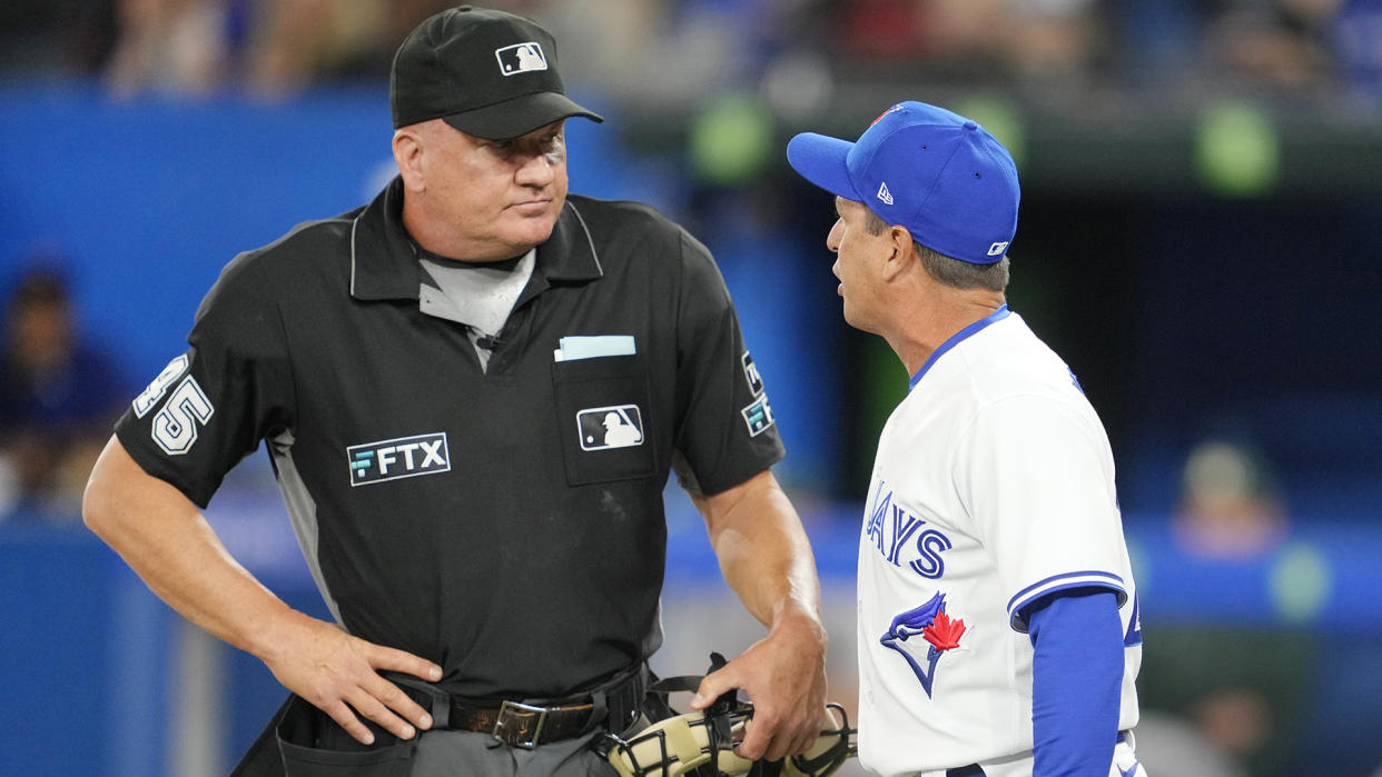 Charlie Montoyo manager of the Toronto Blue Jays argues with home plate umpire Jeff Nelson during a game against the Oakland Athletics. (Photo by Mark Blinch/Getty Images)