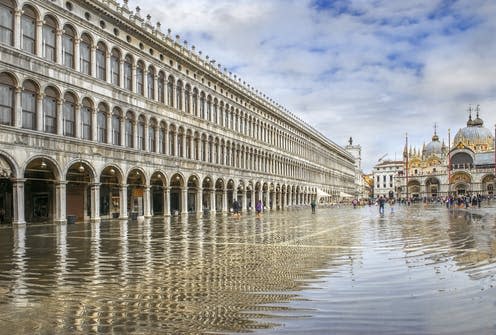 <span class="caption">Piazza San Marco during Venice's acqua alta (flooding). </span> <span class="attribution"><a class="link " href="https://www.shutterstock.com/image-photo/st-marks-square-piazza-san-marco-504909022?src=xhYJ8B5ygi42GPT2zJQziw-1-0" rel="nofollow noopener" target="_blank" data-ylk="slk:Shutterstock.;elm:context_link;itc:0;sec:content-canvas">Shutterstock.</a></span>