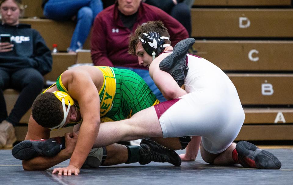 Mishawaka's Christian Chavez and Tippecanoe Valley's Bazle Owens compete in the 195-pound championship match of the regional wrestling meet Saturday, Feb. 5, 2022 at Penn High School. 