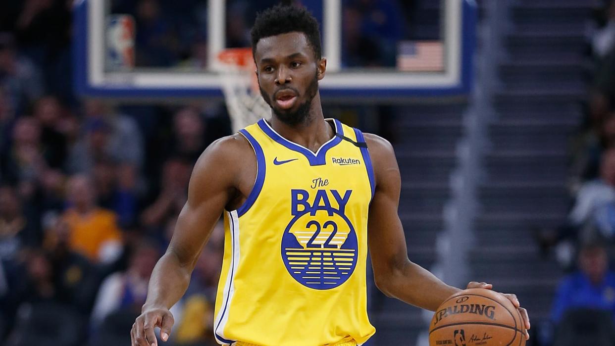 SAN FRANCISCO, CALIFORNIA - MARCH 07: Andrew Wiggins #22 of the Golden State Warriors dribbles the ball up court in the second half against the Philadelphia 76ers at Chase Center on March 07, 2020 in San Francisco, California.