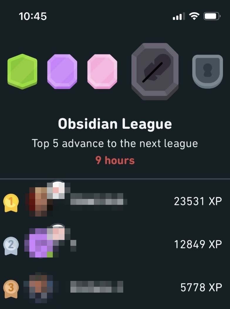 An image shows Obsidian League XP rankings in Duolingo, with usernames and icons blurred out.