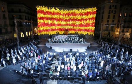 The Catalan flag is seen on the facade of the Palau de la Generalitat during a ceremony to mark "Diada de Catalunya" (Catalunya's National day) on September 11, at Sant Jaume square in central Barcelona September 9, 2015. REUTERS/Gustau Nacarino