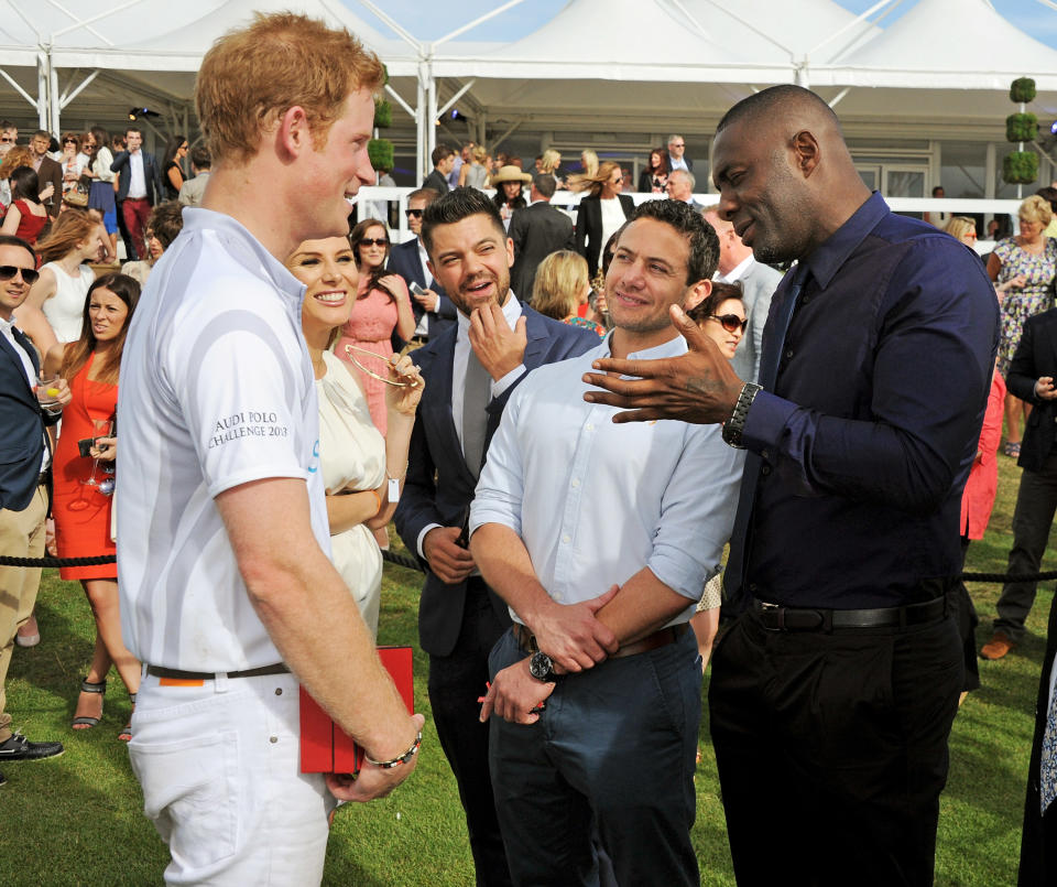 Prince Harry, Tonya Meli, Dominic Cooper, Warren Brown and Idris Elba attend day 2 of the Audi Polo Challenge at Coworth Park Polo Club on August 4, 2013 in Ascot, England.  (Photo by David M. Benett/Getty Images for Audi)