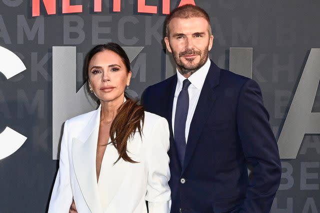 <p>Gareth Cattermole/Getty</p> Victoria Beckham and David Beckham