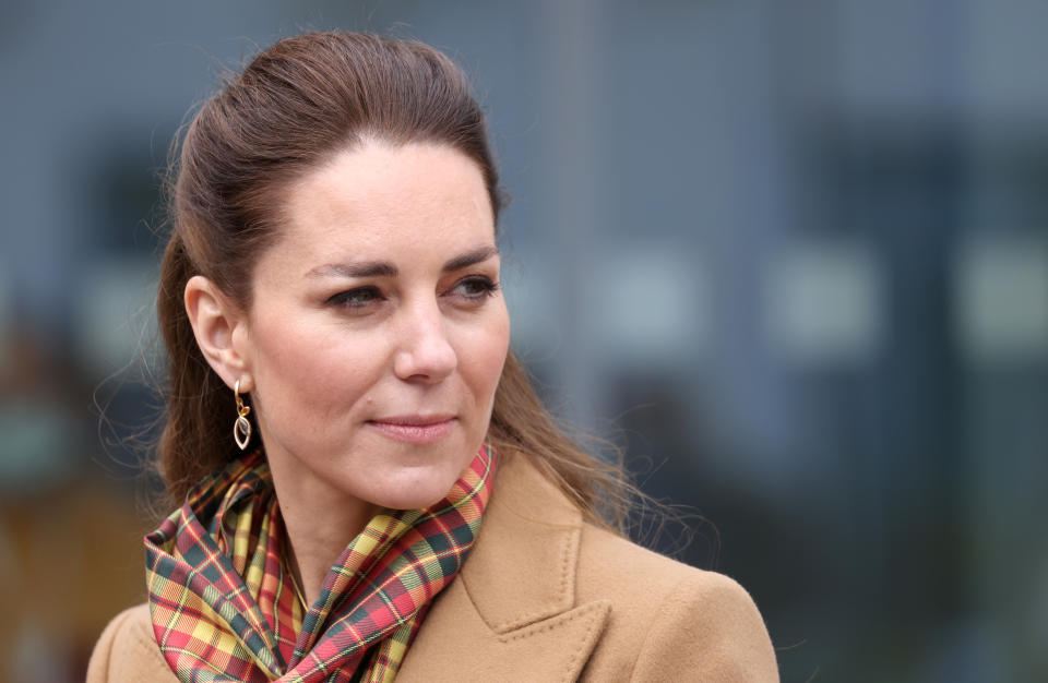 KIRKWALL, SCOTLAND - MAY 25: Catherine, Duchess of Cambridge as she visits to officially open The Balfour, Orkney Hospital with Prince William, Duke of Cambridge on day five of their week long visit to Scotland on May 25, 2021 in Kirkwall, Scotland. Recently opened in 2019, The Balfour replaced the old hospital, which had served the community for ninety years. The new facility has enabled the repatriation of many NHS services from the Scottish mainland, allowing Orkney’s population to receive most of their healthcare at home. The new building’s circular design is based on the 5000-year-old Neolithic settlement, Skara Brae, making it a unique reflection of the local landscape in which many historical sites are circles. (Photo by Chris Jackson - WPA Pool/Getty Images)