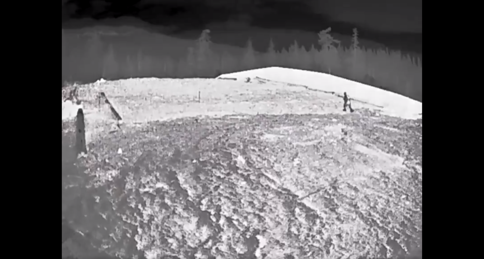 Bigfoot was spotted on video walking along the wildlife overcrossing on I-90, Washington State Department of Transportation officials said. Screengrab from I-90 Snoqualmie Pass on Twitter