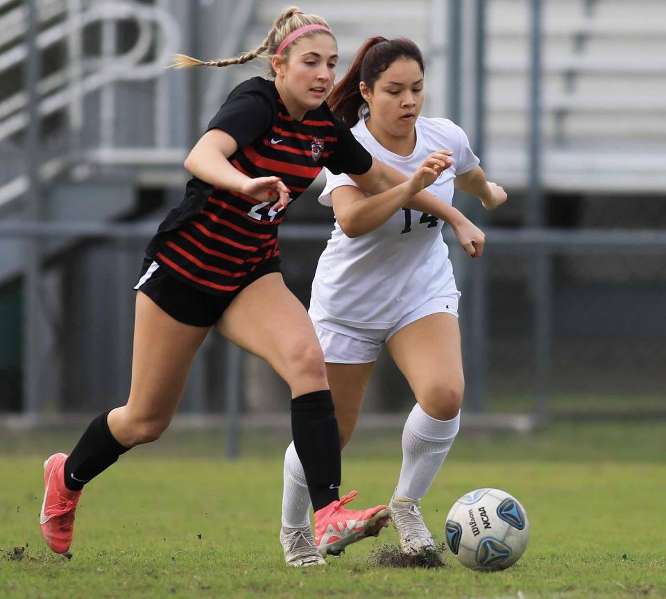 New Smyrna Beach's Taylor Esposito (24) defends the ball during the Five Star Conference boys and girls soccer quarterfinals at Ormond Beach Sports Complex on Saturday, Jan.13th, 2023.