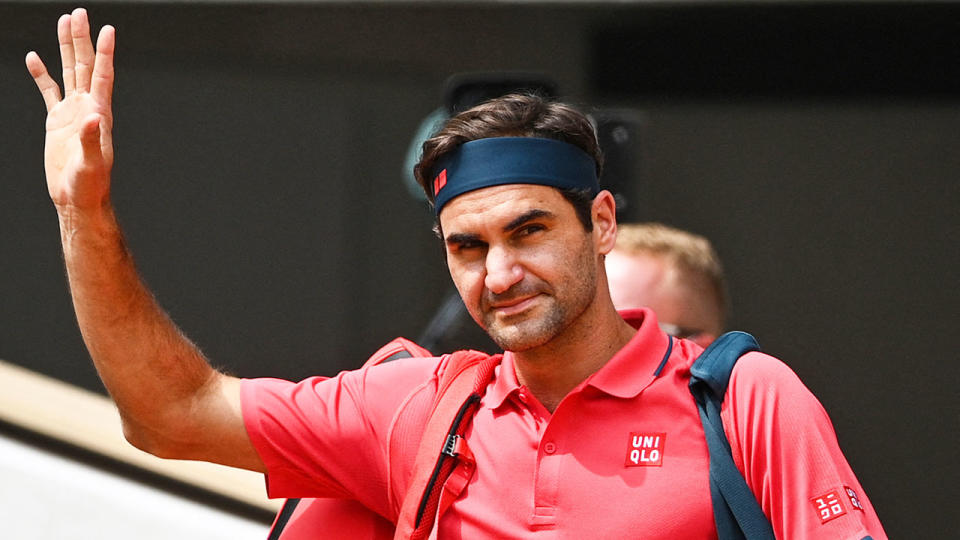 Roger Federer is pictured waving to fans at the French Open.