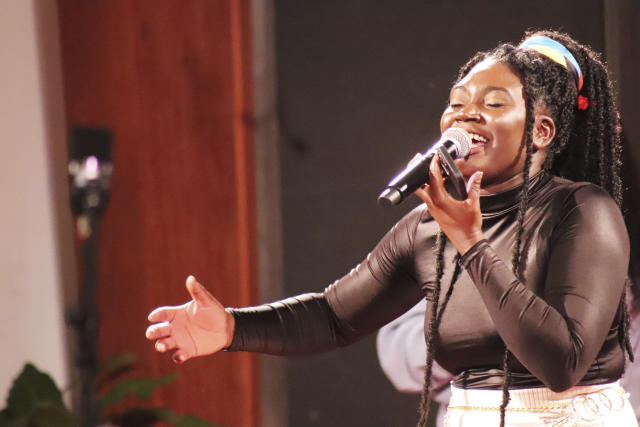 Cariel Coates was the lead singer of the praise team during the "Caribbean Sabbath" at Metropolitan Seventh-day Adventist Church in Hyattsville, Md., on Saturday, Feb. 18, 2023. (Adelle M. Banks/RNS via AP)