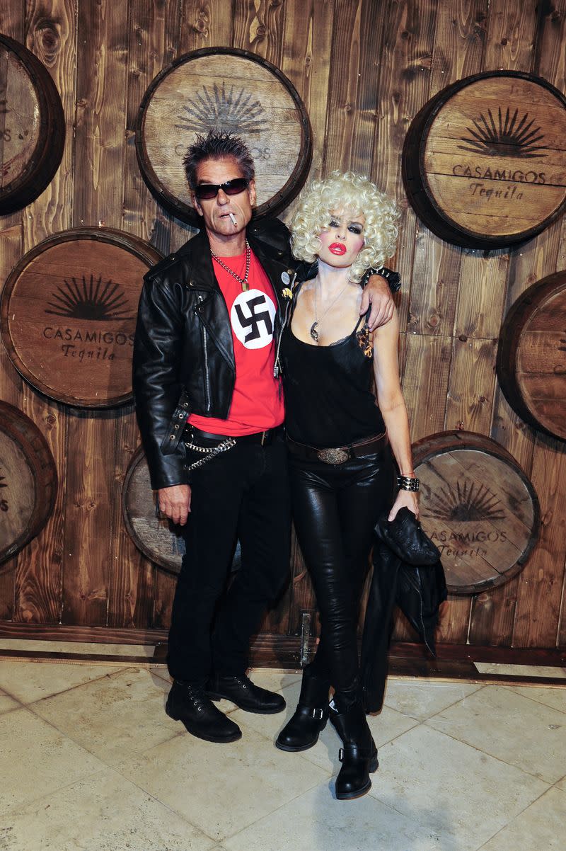 <p> The couple dressed as Sid Vicious and Nancy Spungen for the Casamigos tequila Halloween party. Rinna&#x2019;s husband Harry took things a bit too far for fans when he wore a red tee with a swastika on it. Rinna later took to Instagram to apologize for the incident. </p>