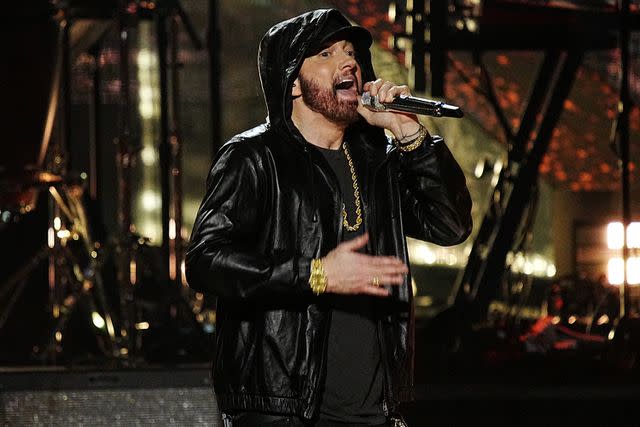 <p>Jeff Kravitz/FilmMagic</p> Inductee Eminem performs on stage during the 37th Annual Rock & Roll Hall of Fame Induction Ceremony in Los Angeles in November 2022