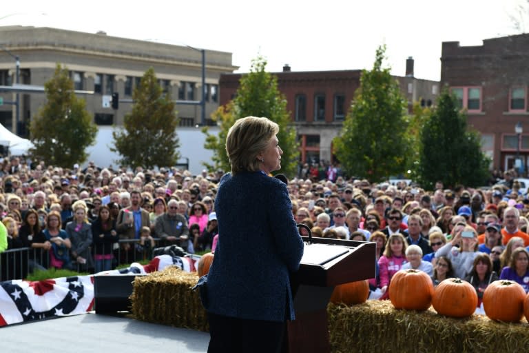 US Democratic presidential nominee Hillary Clinton speaks at a Democratic party "Women Win" early vote rally in Cedar Rapids, Iowa, on October 28, 2016