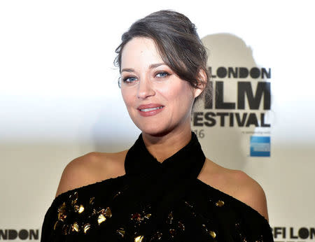 Marion Cotillard poses as she arrives for the gala screening of the film "Its only the end of the world" , during the 60th British Film Institute (BFI) London Film Festival at Leicester Square in London, Britain October 14, 2016. REUTERS/Hannah McKay