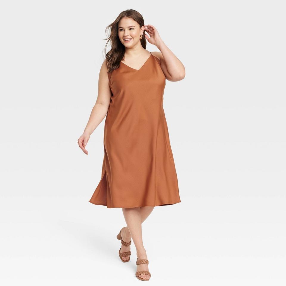 <p><a href="https://go.redirectingat.com?id=74968X1596630&url=https%3A%2F%2Fwww.target.com%2Fp%2Fwomen-39-s-v-neck-slip-dress-a-new-day-8482-brown-3x%2F-%2FA-87373631&sref=https%3A%2F%2Fwww.oprahdaily.com%2Fstyle%2Fg43908182%2Fbest-slip-dresses%2F" rel="nofollow noopener" target="_blank" data-ylk="slk:Shop Now;elm:context_link;itc:0;sec:content-canvas" class="link ">Shop Now</a></p><p>V-Neck Midi Slip Dress in Brown</p><p>$25.00</p><p>target.com</p><span class="copyright">A New Day</span>