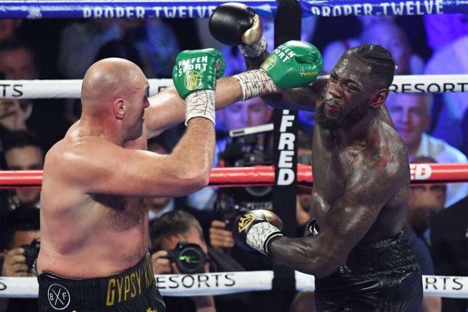 Tyson Fury and Deontay Wilder | MARK RALSTON/AFP via Getty