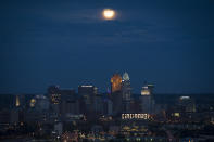 CINCINNATI, OH - AUGUST 31: In this handout provided by the National Aeronautics and Space Administration, a second full moon of the month, known as a Blue Moon, shines over the city August 31, 2012 in Cincinnati, Ohio. The family of Apollo 11 astronaut Neil Armstrong held a memorial service celebrating his life earlier in the day in Cincinnati. Armstrong, the first man to walk on the moon during the 1969 Apollo 11 mission, died August 25. He was 82. (Photo by Bill Ingalls/NASA via Getty Images)