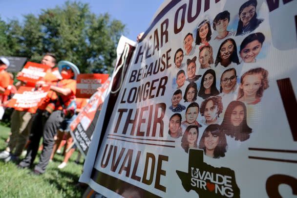PHOTO: The students and teachers killed in the Uvalde, Texas, mass shooting are memorialized on a banner at the March Fourth rally against assault weapons on Capitol Hill in Washington, July 13, 2022. (Jonathan Ernst/Reuters)