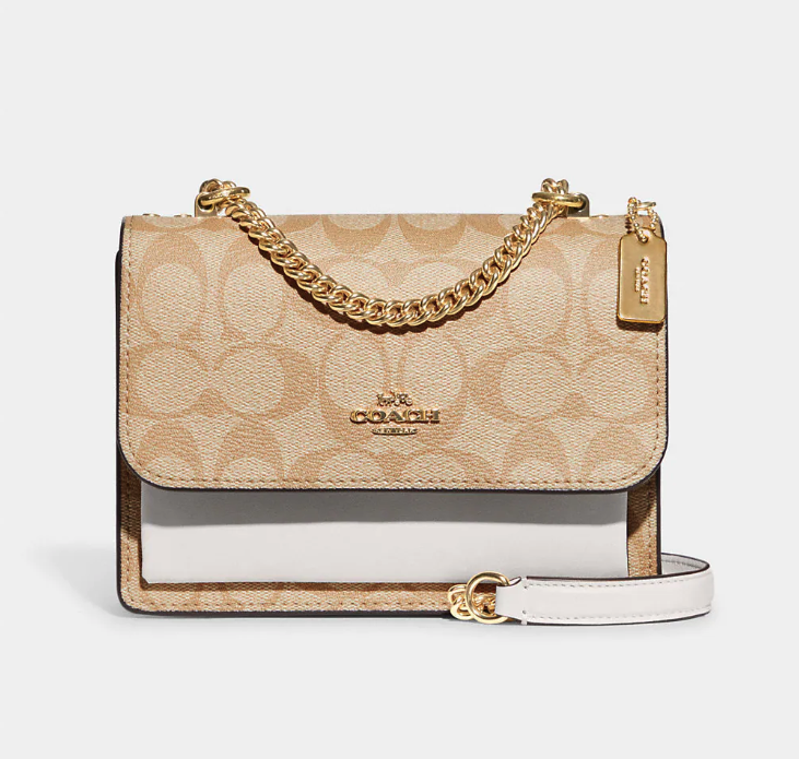 Mini Klare Crossbody In Signature Canvas. Image via Coach Outlet.