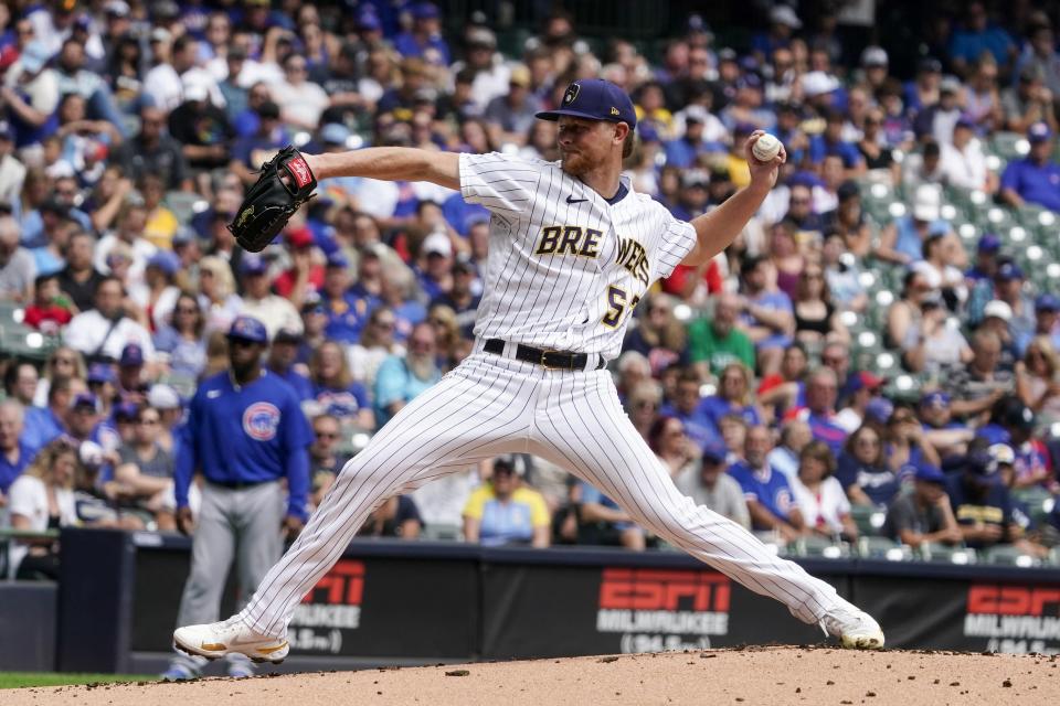 Milwaukee Brewers starting pitcher Eric Lauer throws during the first inning of a baseball game against the Chicago Cubs Sunday, Aug. 28, 2022, in Milwaukee. (AP Photo/Morry Gash)