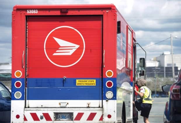 Nearly one million Canadians may have had their names and addresses exposed in a cyberattack on one of Canada Post&#39;s partners. (Darren Calabrese/The Canadian Press - image credit)
