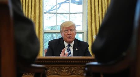 U.S. President Donald Trump speaks during an interview with Reuters in the Oval Office of the White House in Washington, U.S., April 27, 2017. REUTERS/Carlos Barria