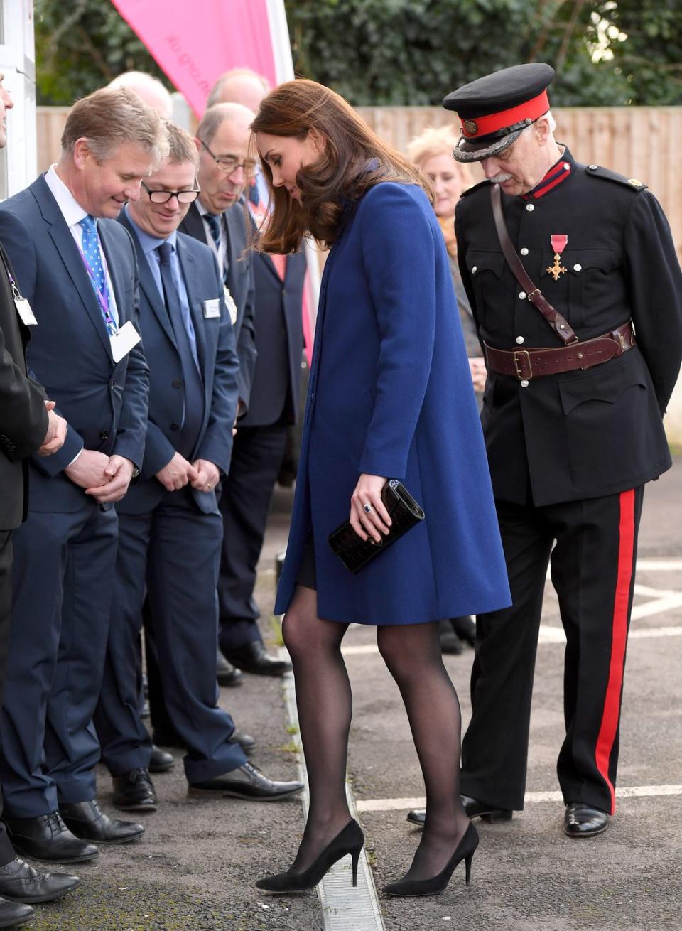 <p>Catherine, Duchess of Cambridge struggles with another stuck heel at the opening of the Action On Addiction Community Treatment Centre in Essex. </p>