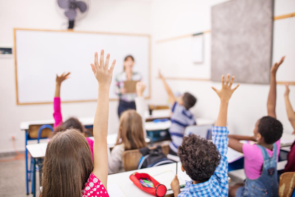 Building up children&rsquo;s self-esteem at home can help with their confidence in the classroom. (Photo: alvarez / Getty Images)